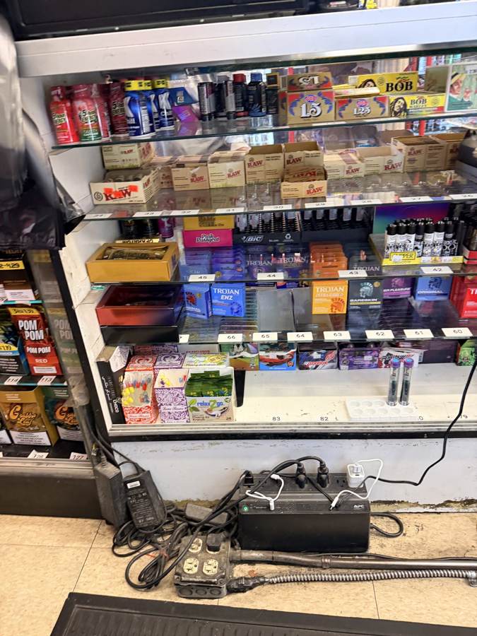 Papers and lighters behind the counter